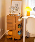 Heavy Duty Rolling Storage Cart With Smooth Swivel Wheels Keeps Your Clutter Down And Looking Slick with dual bins beside a desk.