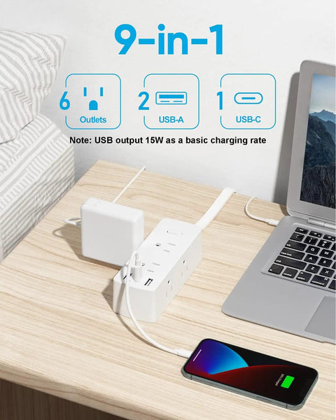 Flat Plug Power Strip With Five Foot Extension Cord Giving Six Wide Spaced AC Outlets Plus Three USB Charging Ports Including One Fast Type C on a desk.