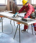 Beefy Saw Horses 2 Pack Portable Galvanized Metal Work Stand With Non Slip Top in use, supporting cutting work in a woodshop.