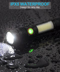 Beast Bright LED Flashlight With Magnetic Tail COB Sidelight Zoomable Beam Waterproof IPX5 shown in rain