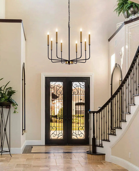 8 Light Farmhouse Chandelier With Dope Black And Gold Finish Modern Candle Pendant Lighting in foyer over staircase.
