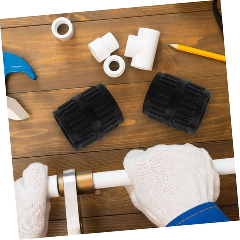 Two Piece Tubing Deburring Tools Reamers For Pipes Set on wooden table with plumbing materials