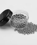500 Count 4.5 Millimeter G100 Precision Stainless Steel Bearing Balls in a clear container, ideal for automotive repair and smooth rotary projects.