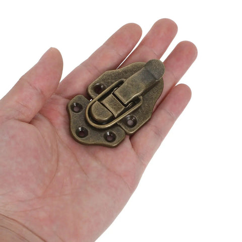 Upgrade Your Toolbox Gear With These 6pcs Cold Rolled Steel Duckbilled Hasp Locks For Secure Cabinet And Chest Storage At Just 7. 40x4. 30cm A Perfect Deal For Any DIY Pro Or Handyman Looking To Keep Their Tools Locked Up Tight And Safe From Thieves. brass duckbilled hasp lock, 7.4x4.3cm, in hand