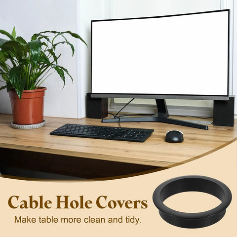 Boss Level Zinc Alloy Desk Grommet With Two And Three Quarter Inch Cable Hole Cover Featuring Marked Cable Ties For Zero Sweat Office Organization And Fast Wire Routing Setup on a clean desk with a plant.