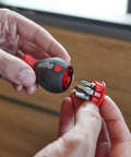Hands holding a Compact Stubby Screwdriver With Six In One Torx Bits T8 T10 T15 T20 T25 T30 Soft Finish Cushion Grip