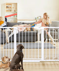Extra Wide Baby Gate For Stairs And Doorways 57 Inch Extended White Walk Through Safety Gate With Kids Playing And Pets Sitting