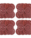 Assorted 8 Inch Hook And Loop Sanding Discs With Center Hole For Wood Metal And Plastic Grit Grinders stacked for power tool use.