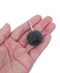 Hand holding a single 4.5 cm disc from Pro Grade Bulk Pack Double Layer Surface Conditioning Buffing Wheels Set 100 Pieces 4.5 cm Polishing Discs