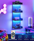 Multi Tier Floating Wall Shelves With Glowing RGB LED Lights And Sleek Black Frame For Wall Mounted Home Storage Vibes That Are Straight Up Dope And Legit Solid showing decorative items and gaming controller.