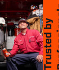 Technician holding Rust Busting Penetrant With Silicone For Major Rust in 10 oz aerosol spray inside a work van, text "Trusted by Professionals."
