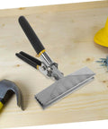 Hand Seamer Metal Bender Tool for Sheet Metal Bending and Flattening on wooden table with ergonomic handle, pliers visible