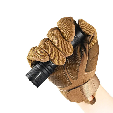 Gloved hand holding Defender P16 Tactical Flashlight With Dual Tail Switch, 1800 Lumens Rechargeable Handheld Light