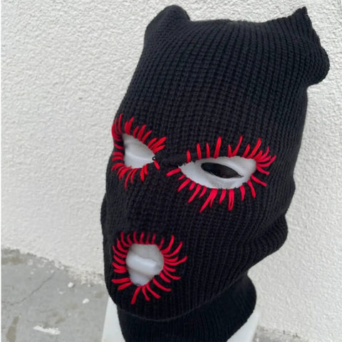 Distressed Halloween Balaclava Full Face Mask With Knit Beanie Hooded Style featuring red stitched eye and mouth cut-outs.