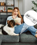 Woman on a couch surprised while eating popcorn, with Rock Solid Sectional Couch Connectors Eight Piece Galvanized Iron Sofa Brackets visible.