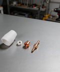 32 Piece Plasma Cutter Consumable Kit For PT-31 LGK40 Plasma Cutters High Grade Copper Tips And Nozzles Ready To Install For Clean Cuts, featuring copper tips and nozzles.