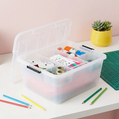 Clear 18 Qt Storage Organizer With Removable Dividers And Lid, stackable plastic box containing craft supplies on a table