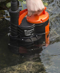 One Half HP Submersible Sump Pump 2110GPH Portable Electric Water Pump With Built-In Float Switch for pool drainage shown in water