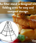 Fryer Oil Filter Stand With Folding Arms That Clamps To Deep Fryers next to waffles, emphasizing easy and compact storage.