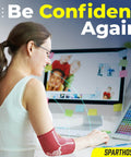 Woman using computer wearing elbow compression sleeves for pain relief and support, large flamingo pink, boosts blood flow.