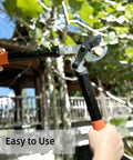 Hands using a Powerful Gear Action Pruner with Sharp Steel Blade for tree trimming, cutting a branch up to 1.3 inches, outdoors.