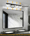 Three Light Crystal Bathroom Vanity Light Fixture Black Modern LED Wall Light 6000K Cool White Bath Light Over Mirror For Home And Master Bathrooms Looks Lit And Fresh with black frame and K9 crystal shades above a large bathroom mirror.