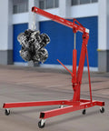 Heavy Duty Foldable Shop Crane Engine Hoist Rolling Cherry Picker With 4409 Lb Capacity lifting an engine, showing red hydraulic boom and casters.
