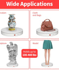 Foxvee Motorized Electric Turntable Remote Controlled Rotating Display Stand Speed Adjustable 360 Degree Photography Platform For 3d Scan Showcase And Multi Mode Video With White Finish showcasing porcelain vase, handbag, sculpture, and model dress.