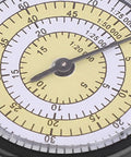 Close-up of the dial on the Compact Mini Outdoor Map Measurer and Distance Calc showing measurement scales and markings.