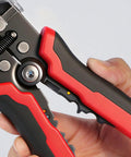 Close-up of All In One Wire Stripper And Cutter For Electricians And DIY Handymen with ergonomic red and black handles.