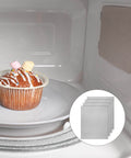Microwave interior with 4 Pc Waveguide Cover Replacement Kit with scissors, 150mm by 120mm mica sheets displayed, heat resistant covers installed.