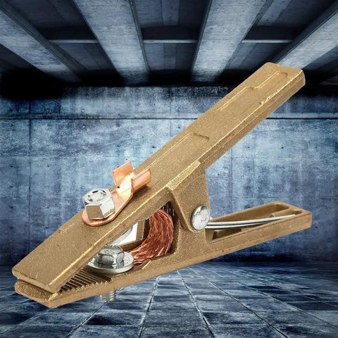Heavy Duty Brass A Shape Ground Welding Earth Clamp Rated For 300 Amps showcased against a textured industrial background.