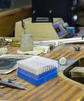 Super Soft Beige Wool Buffing Wheels With 3Mm Steel Shank For Effortless Polishing and Gentle Surface Care on Delicate Items Without Scratching or Damage To Get That Sparkling Shine on a workbench.
