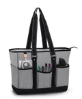 Gray nurse tote bag with padded 15.6 inch laptop sleeve, visible front pockets for organized gear, shoulder straps for work on the job.