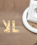 Brass Down Pivot Door Hinges Four Pack Hidden Concealed Invisible Hinges for Wood and Windows on wooden surface