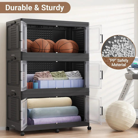 Industrial Grade 800 Quart Stackable Storage Bins With Smooth Wheels And Secure Doors Hella Spacious Foldable Cabinet Organizer Set Four Pack Black Divided Garage Shelves with basketballs and towels.