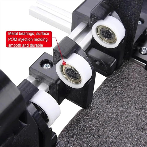 Close-up of heavy duty manual box folding tool for shipping cartons, showcasing metal bearings and smooth wheels for quick adjustment.