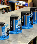 Heavy Duty Toe Jack Hydraulic Floor Lift For Containers And Machinery, 5 To 10 Ton Capacity, Ultra Low 0.875 Inch Clearance, displayed in a workshop
