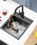 Single Bowl Undermount Bar Sink In Brushed Nickel 15 Inch By 15 Inch 18 Gauge 304 Stainless Steel With Satin Brushed Finish filled with ice and bottles.