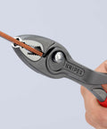Slim Front And Side Grip Pliers With Box Joint And Push Button Adjustment For Tight Spots, 200 Mm in use gripping a wire
