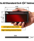 Badass Shade 10 Auto Darkening Welding Lens, 2 X 4 1/4 Inches held in hand, showcasing dimensions and red coated view.