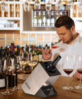 Single Bottle Wine Chiller For 750ml Bottles Iceless Stainless Steel Cooler in bar setting with tasting glasses