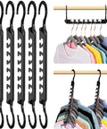 Magic Hangers Space Saving No Brainer 10 Pack Upgraded Sturdy Smart Space Saver Hangers Ultra Premium Black Hooks hangers displayed.