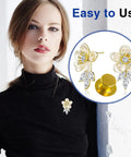 Woman wearing a flower brooch secured with Lock Tight Gold Pin Backs 100 Pack Secure Clasps For Enamel Pins Brooches And Lapels Nickel Plated Copper No Hassle Spring Design Hang Firm Zero Slip Grip For Real World DIY Projects.