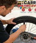 Person using a tire lever on a bike wheel with 1 Pack 20x4 Fat Tire Inner Tube With Schrader Valve For Mountain Bikes And E Bikes