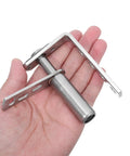 Stainless Steel Double Swing Door Hinges With Self-Closing Spring Load For 16mm-20mm Doors shown in hand