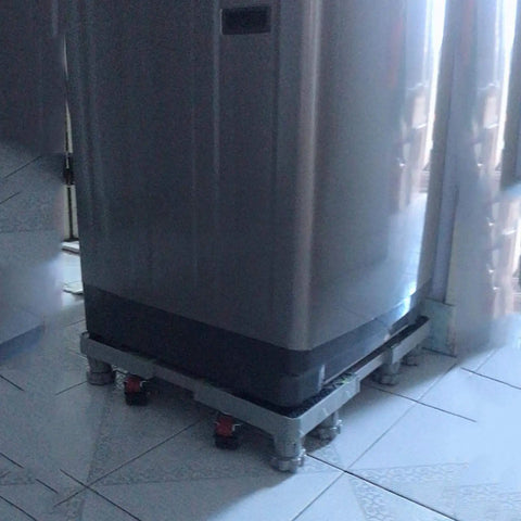 Heavy Duty Shockproof Fridge Base Stand Universal Appliance Riser With Beefy Anti Vibration Floor Guards Built Like A Tank For Home Washers Dryers And Portable AC Units White under a fridge on tiled floor.