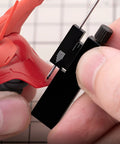 Kickass Precision Adjustable Parallel Scribing Ruler With Sturdy Aluminum Frame And Razor Sharp Tungsten Needle marking a red model.