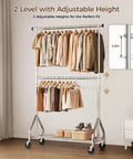Kickass Durability Double Rod Clothes Rack with adjustable height, holding clothes on hangers in a stylish bedroom setting.