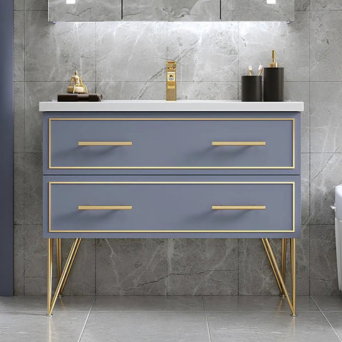 Bathroom vanity with gold hardware and legs, gray cabinets, elegant design